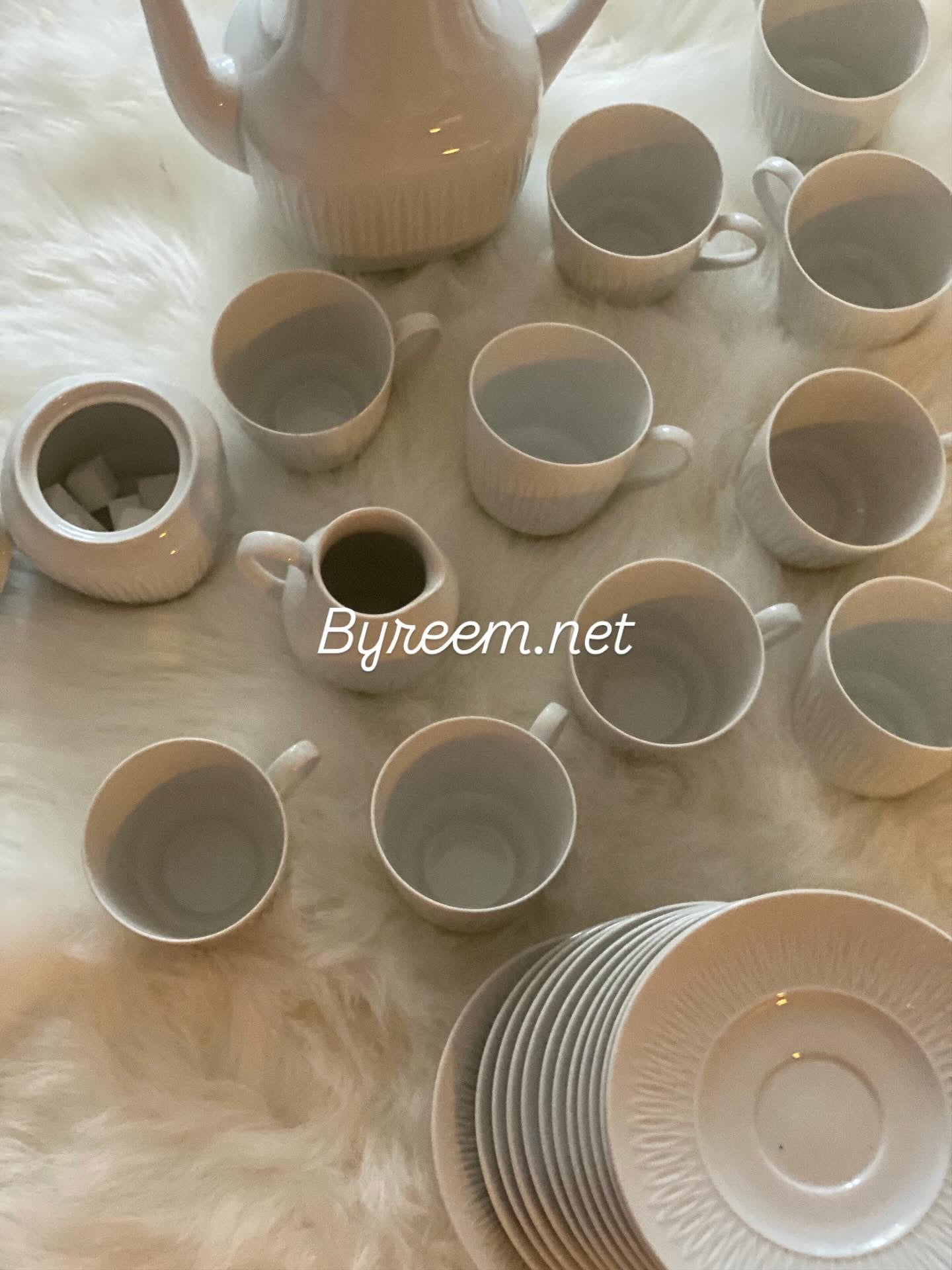 Elegant vintage coffee set in white