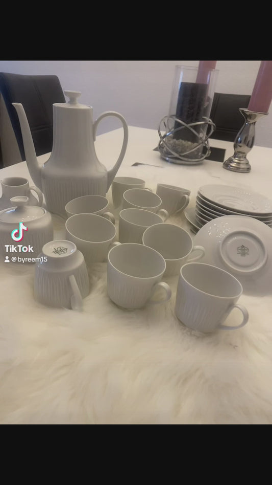 Elegant vintage coffee set in white